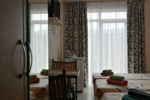 Изображение Изображение: 2-местный стандарт"Комфорт видом на горы" 2 этаж #1 #2