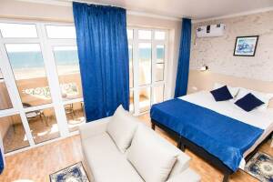 Изображение Изображение: 4-х местный «Джуниор сьют» с видом на море #1 #6