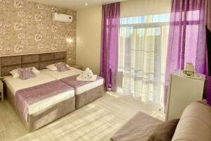 Изображение Изображение: Двухкомнатный номер Делюкс #1 #2