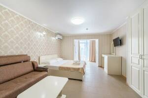 Изображение Изображение: Четырехместный номер с балконом #1 #1