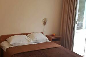 Изображение Изображение: № 5 Двухкомнатный номер на 4−5 человек с балконом #1 #5