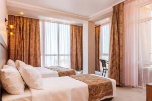 Изображение Изображение: Трехместный люкс с балконом панорамный вид на море #1 #6