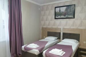 Изображение Изображение: Двухместный номер с двумя отдельными кроватями #1 #7