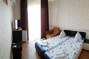 Изображение Изображение: Двухместный номер с 2 отдельными кроватями #1 #2