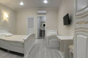 Изображение Изображение: Улучшенный 4-местный с личным балконом #1 #2