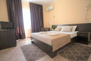 Изображение Изображение: Двухкомнатный 5-ти местный номер «Люкс» c балконом #1 #5