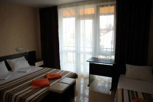 Изображение Изображение: Трехместный номер с террасой 1 этаж #1 #5