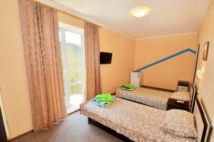 Изображение Изображение: Двухместный с двумя раздельными кроватями #1 #2