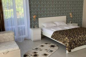 Изображение Изображение: Апартамент Делюкс 6 с балконом и видом на горы #1 #6