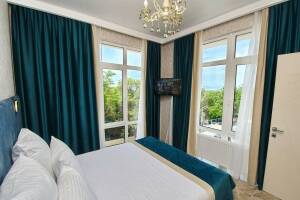 Изображение Изображение: Двухкомнатный четырехместный с балконом #1 #2