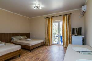 Изображение Изображение: Четырехместный номер с балконом #1 #4