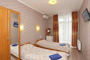 Изображение Изображение: Двухместный номер с двумя кроватями, балконом #1 #2