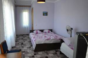 Изображение Изображение: Трехместный номер «Стандарт» с видом на море #1 #1