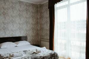 Изображение Изображение: № 9 Четырехместный номер с балконом (2 этаж) #1 #6