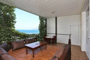 Изображение Изображение: Четырехместный номер с видом на море #1 #5