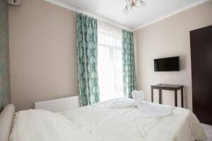 Изображение Изображение: Двухкомнатный номер с балконом (3 этаж) #1 #6