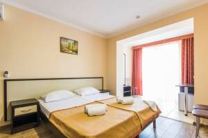 Изображение Изображение: Двухкомнатный четырехместный Стандарт (кат. 3*) #1 #2