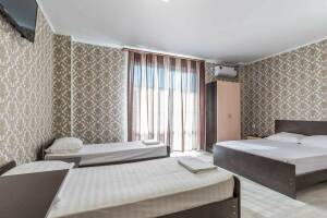 Изображение Изображение: Четырехместный номер Стандарт с индивид. балконом #1 #9