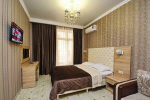 Изображение Изображение: Люкс двухкомнатный пятиместный с балконом #1 #2