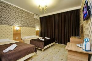 Изображение Изображение: Четырехместный номер с балконом #1 #5