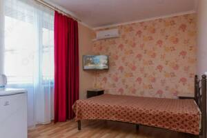 Изображение Изображение: Четырехместный номер с удобствами и балконом #1 #12