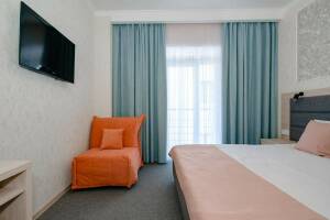 Изображение Изображение: Двухместный номер с креслом с балконом #1 #4