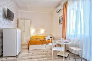 Изображение Изображение: Четырехместный номер с удобствами, балконом #1 #3