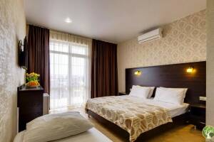 Изображение Изображение: Трехместный делюкс с балконом #1 #2