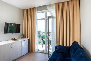 Изображение Изображение: Трехместный «Делюкс» с балконом #1 #4