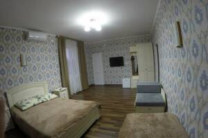 Изображение Изображение: Семейный 4-х местный номер (2 этаж) #1 #2