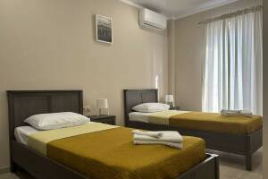 Изображение Изображение: Стандартный двухместный с 2 отдельными кроватями #1 #2