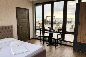 Изображение Изображение: Двухместный «Терраса» с видом на море и горы #1 #5