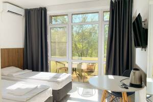 Изображение Изображение: 2-комнатный 4-местный номер (с балконом) #1 #10