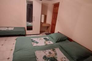 Изображение Изображение: Четырёхместный номер «Стандарт» с видом на сад #1 #2