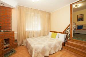 Изображение Изображение: Двухкомнатный номер с кухней и камином #1 #2