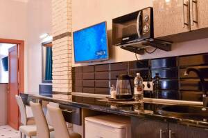 Изображение Изображение: Пятиместный двухкомнатный номер «Модерн» #1 #2