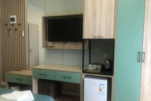 Изображение Изображение: Трёхместный номер с патио и кухней #1 #3