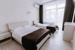 Изображение Изображение: Двухкомнатные апартаменты на первом этаже #1 #2