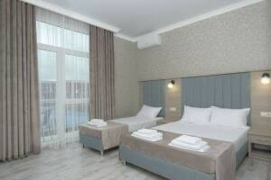 Изображение Изображение: Трехместный номер люкс #1 #2