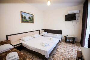 Изображение Изображение: 4-х местный номер «Стандарт» с балконом #1 #4