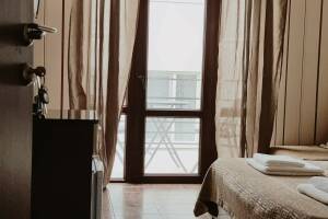 Изображение Изображение: Трёхместный номер с балконом #1 #4