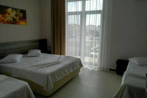 Изображение Изображение: Четырехместный улучшенный номер #1 #3