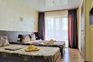 Изображение Изображение: Трехместный Де Люкс Обзорный Вид на море и терраса #1 #5