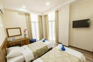 Изображение Изображение: Номер с раздельными кроватями и завтраком #1 #32