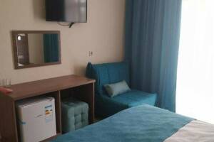 Изображение Изображение: Трехместный номер «Делюкс» с балконом #1 #4