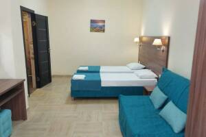 Изображение Изображение: Четырехместный номер «Делюкс» #1 #5