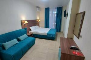 Изображение Изображение: Четырехместный номер «Делюкс» с балконом #1 #6