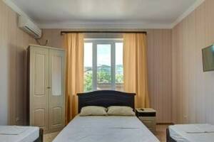 Изображение Изображение: Четырехместный номер эконом #1 #4