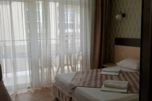 Изображение Изображение: 2-х местный «Стандарт» с доп. местом с балконом #1 #2